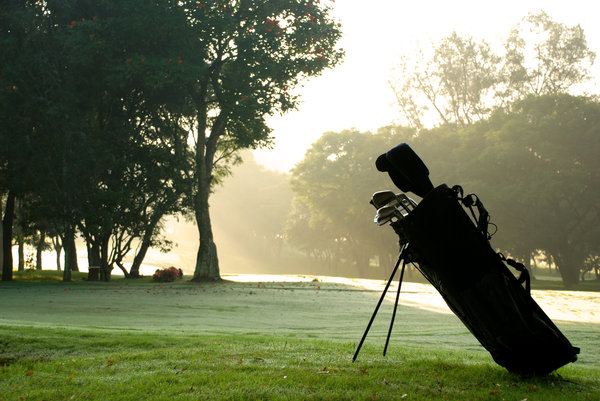 Golf bag at sunset
